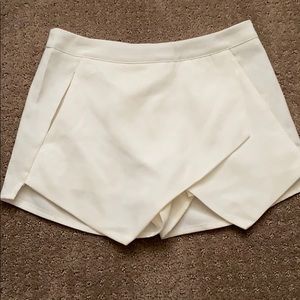 White envelope skort